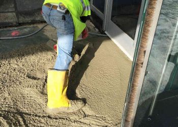 50 Connell Man Spreading Concrete