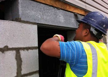 Hurricane Sandy Man Sealing Work